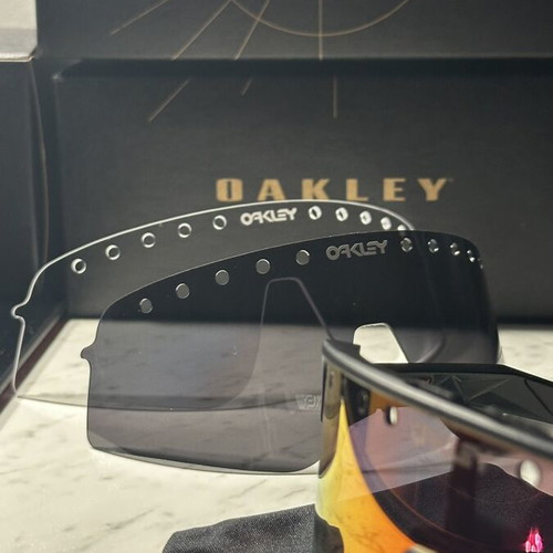 Oakley Sutro sunglasses new with two lenses black and red