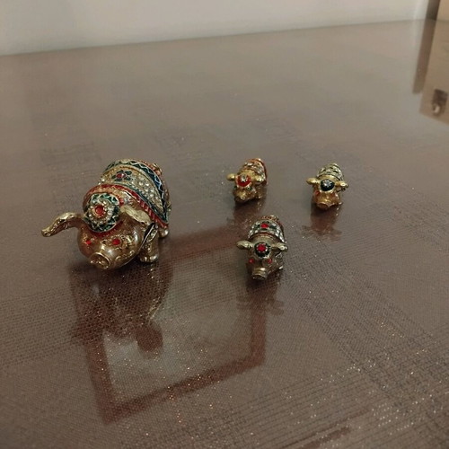 Forged Gianniotika Pig Figurines like new, set of 4 for positive feng shui