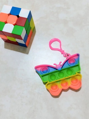 Rubik's Cube 3x3 and Butterfly Pop It Fluo Set like new