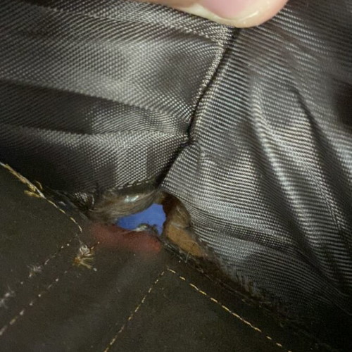 Wallet used, brown with fabric tear at cash compartment