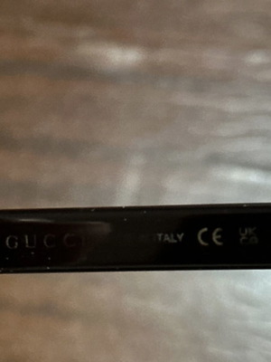 Gucci sunglasses used, black and gold