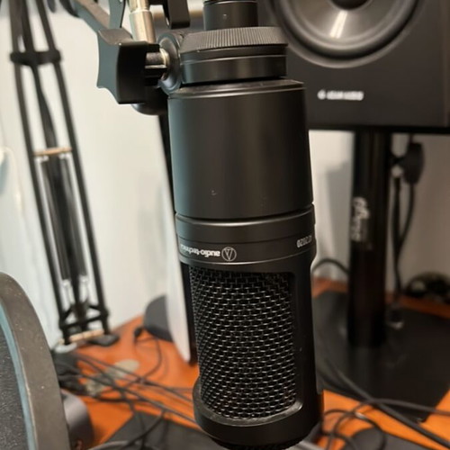 AudioTechnica AT2020 condenser microphone with boom arm and pop filter