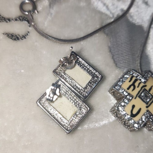 Silver 925 jewelry set like new, earrings and cross pendant