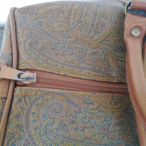 Brown travel sack used with leather details