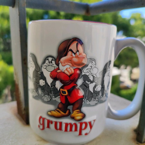 Grumpy Disney Mug new with embossed design