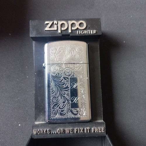 Zippo lighter new with engraving H & K, 1995