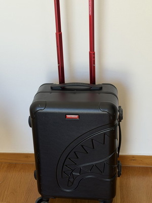Sprayground limited edition carry-on luggage used, black