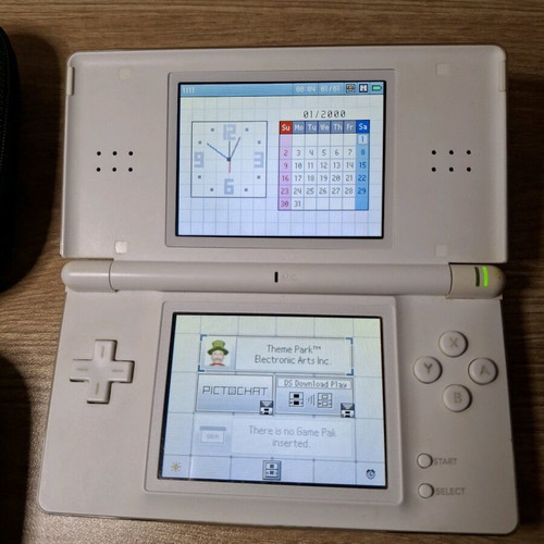 Nintendo DS Lite Polar White like new with charger and case
