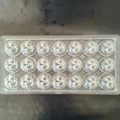 Polycarbonate mold for round chocolates used, 21 cavities