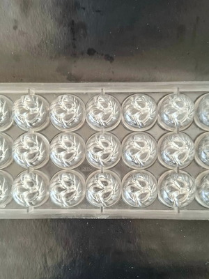 Polycarbonate mold for round chocolates used, 21 cavities
