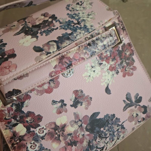 Handbag like new, pink with floral pattern, multiple pockets and strap