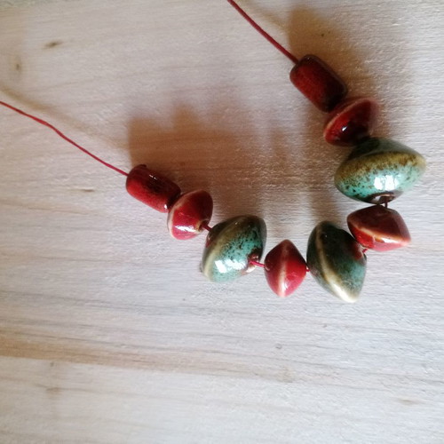 Ethnic porcelain bead necklace used, blue and red colors