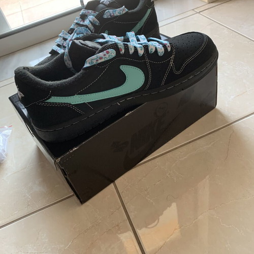 Nike Air Jordan black sneakers with floral laces
