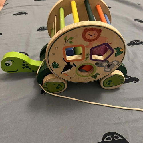 Wooden developmental toy with shapes, animals and colors like new