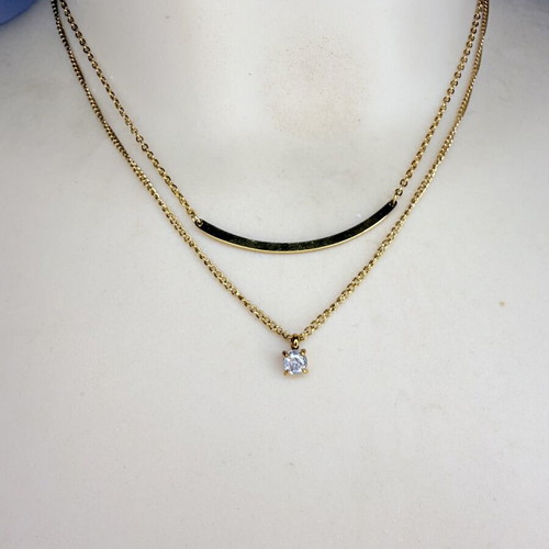 Double women's necklace in gold color with metal detail and small diamond, like new