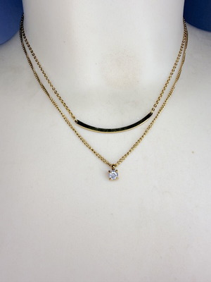 Double women's necklace in gold color with metal detail and small diamond, like new