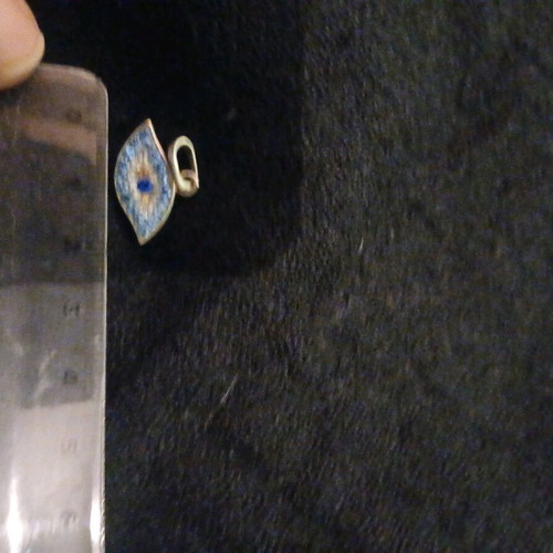 Silver evil eye pendant like new, turquoise and silver