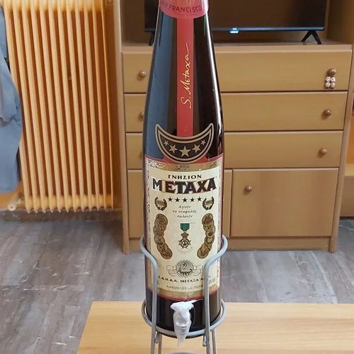 Metaxa 5* cognac 3 liters like new with tap and metal stand