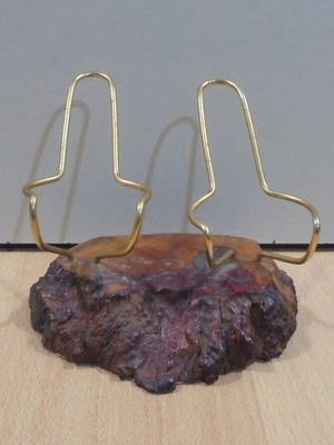 Metal decorative pipe stand used for two pipes on wooden base
