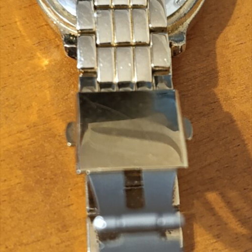 Daniel Klein wristwatch like new, gold bracelet, women's
