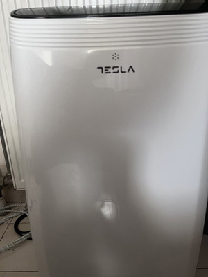 Tesla air conditioner with dehumidifier, fan and heating like new