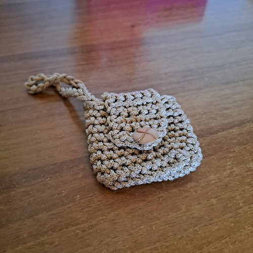 Small knitted wallet used