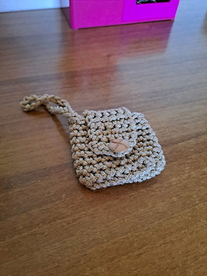 Small knitted wallet used