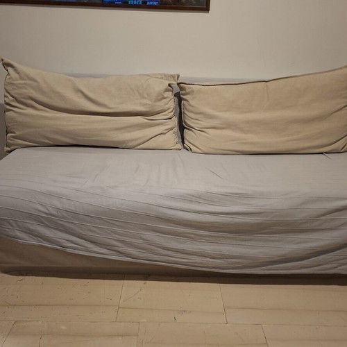 Ikea sofa bed used with storage and 2 cushions