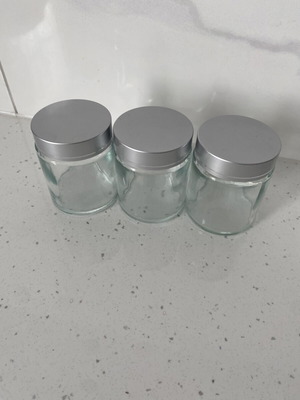 Set of 3 glass storage jars with silver lids like new