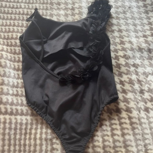 Bodysuit like new, black, without fasteners with padding