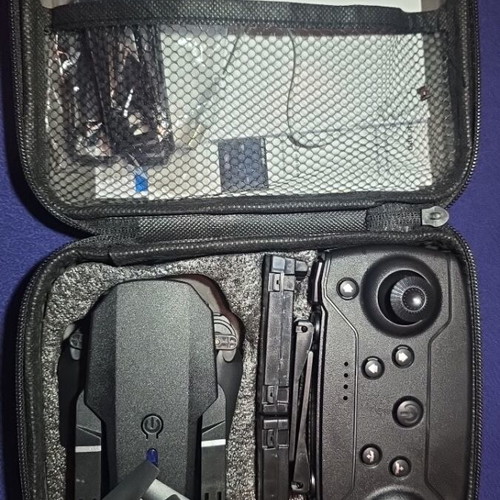 Drone new with 3 batteries, case and spare propellers