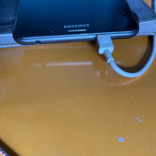 Samsung Galaxy Tab A (2016) used with book case and charging cable
