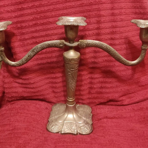 Metal triple candlestick used, ornate and heavy