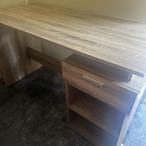 Wooden desk with drawer and open storage, brown oak finish