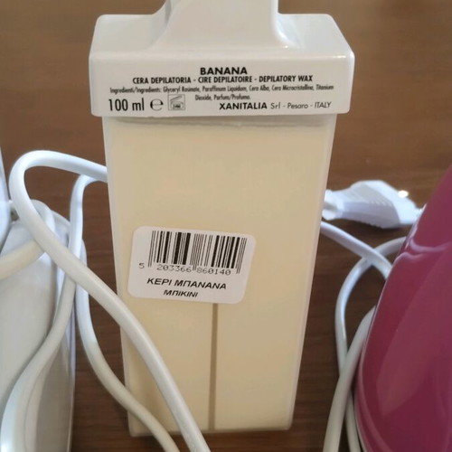 Double wax melting hair removal device like new with 3 cartridges and strips