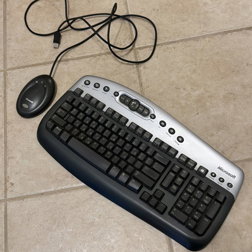 Microsoft Wireless Multimedia Keyboard and used functional desktop computer