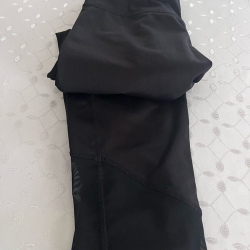 Bershka black leggings like new, below the knee with transparency
