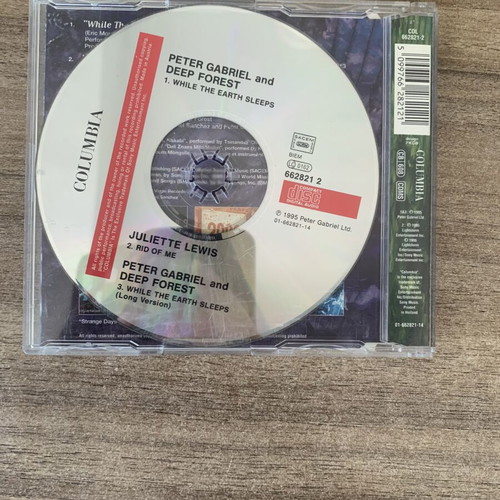 While The Earth Sleeps Maxi CD Single by Deep Forest with Peter Gabriel used