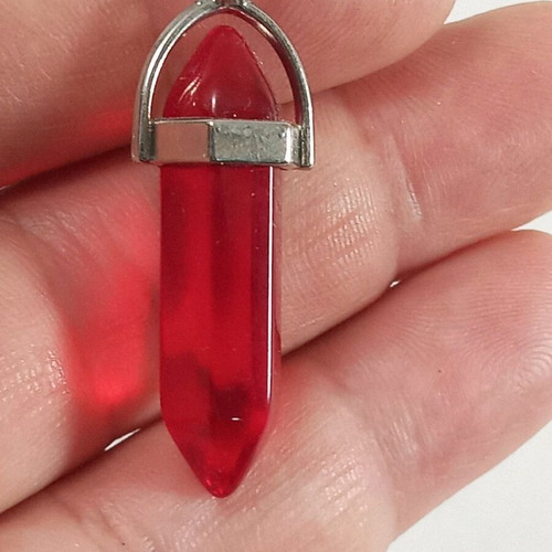 Metal pendant with red glass like new, 4.5 cm length