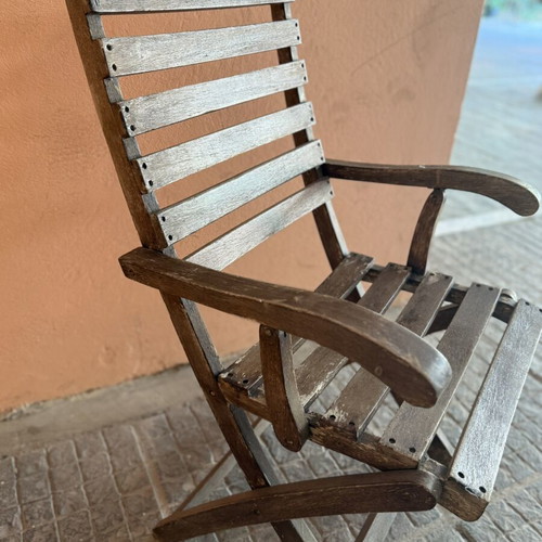 Wooden folding garden chair used with armrests