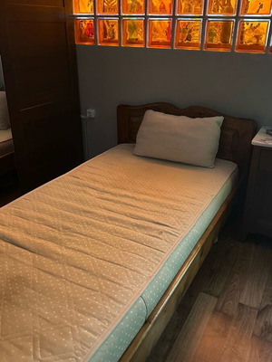 Wooden bed used with mattress in good condition