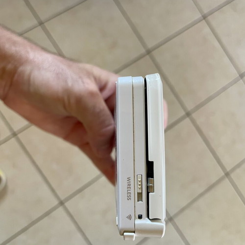 Nintendo 3DS white console with charger and case