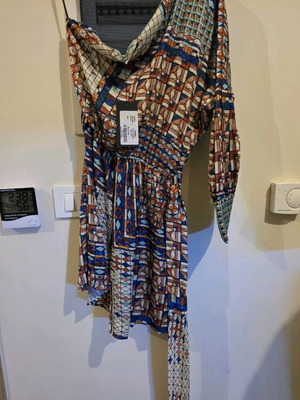 One-piece shorts with one sleeve new, one size