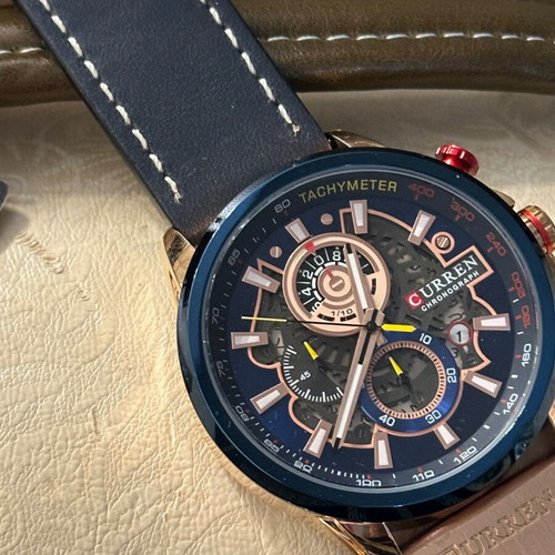 Curren men's watch new with leather strap blue and red