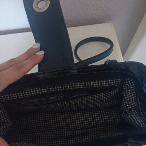 Women's black handbag with silver details, like new