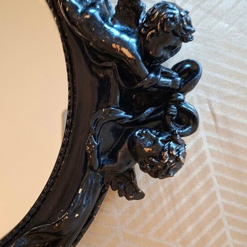 Vintage black mirror with putti used, 33x30 cm