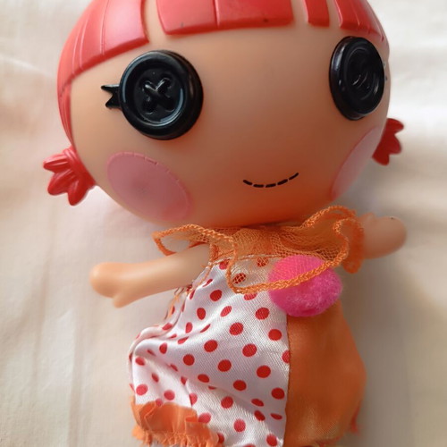 Lalaloopsy doll used, dress with loose thread on leg