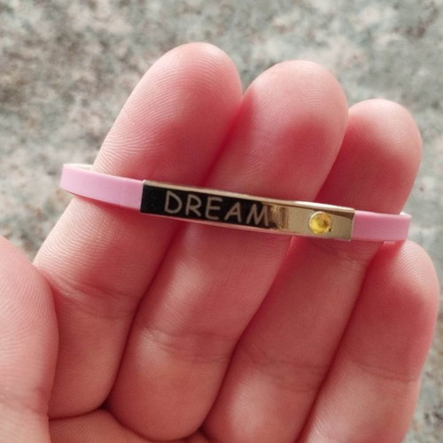 Rubber bracelet pink new with metal dream decoration