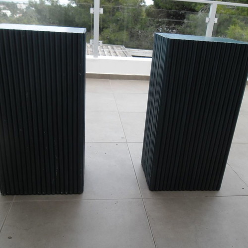 Console table used with 2 blue/navy bases and glass top
