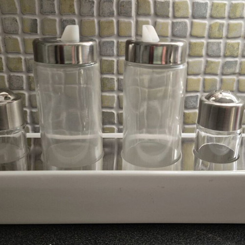 Oil and vinegar set with salt and pepper like new, glass base